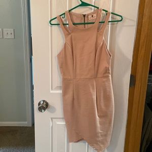 Sleeveless nude mini dress.